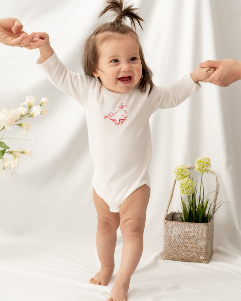 Organic cotton long sleeve baby bodysuit. Made from 100% Certified Organic Cotton. Undyed nature white color. Safe for sensitive skin.